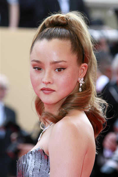 Devon Aoki knows that an almost bare face with black liquid eyeliner
